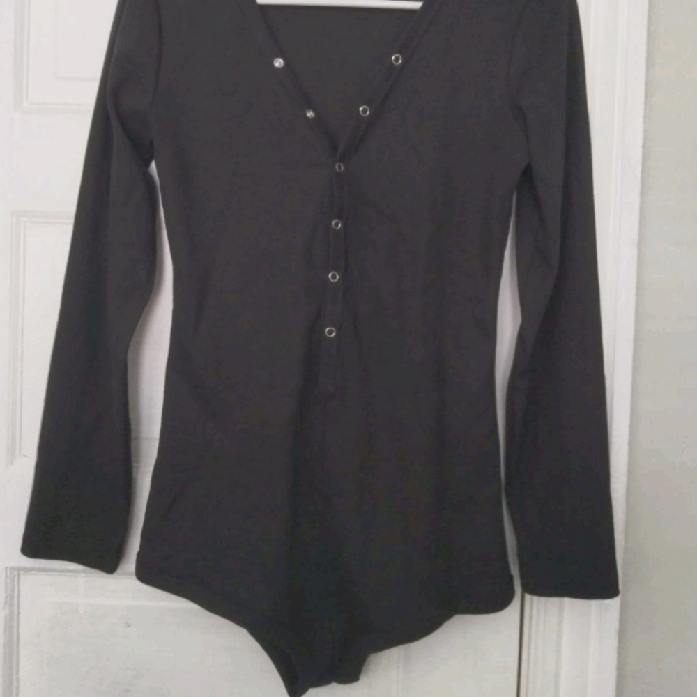 Brand new adult onesie. Only worn once to try on.